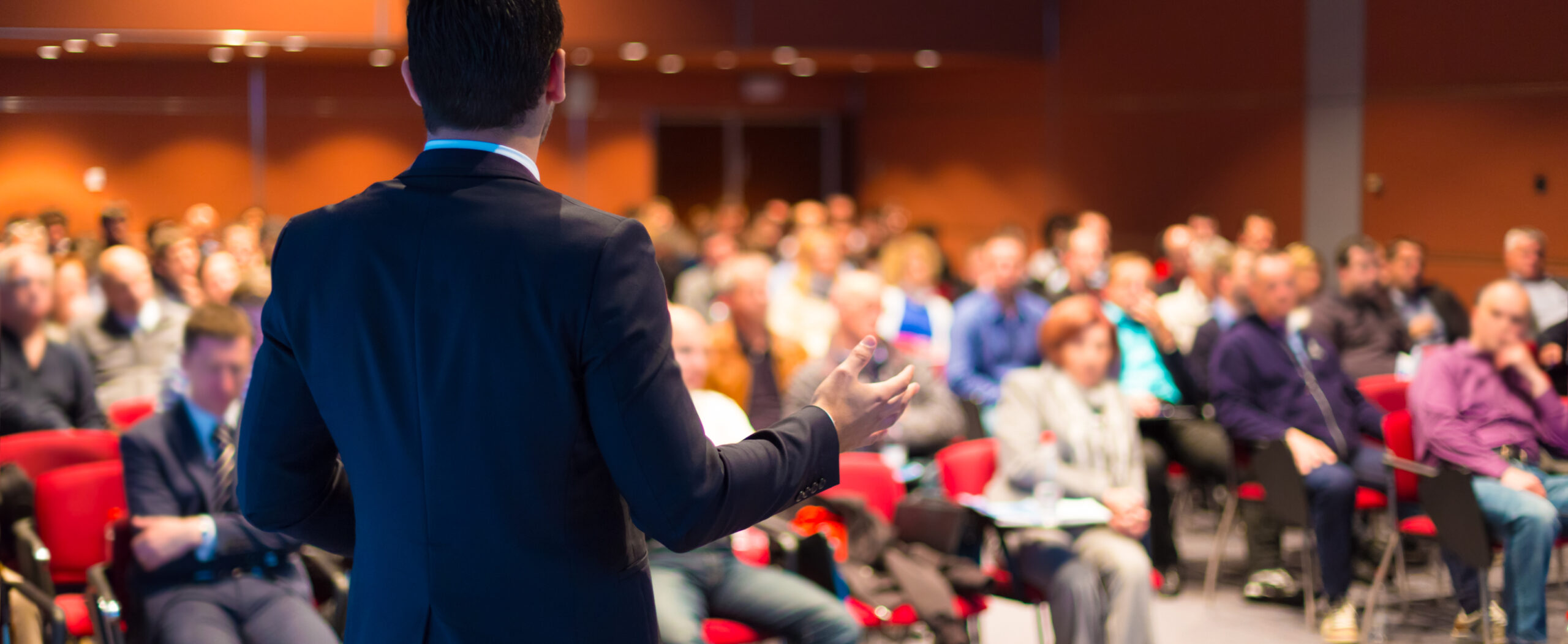 hybrid event people in the room speaker